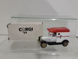 a small toy truck with a box on the back of it