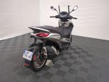 a motorcycle that is parked in a garage