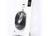 a black and silver computer mouse in a package