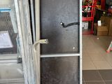 a metal door that is open in a store