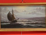 a picture of a painting hanging on a red wall