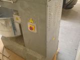 a machine that is sitting on a pallet in a garage