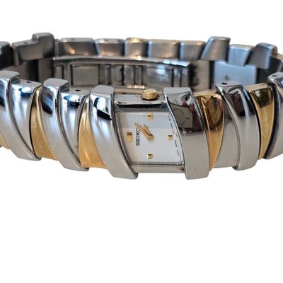 an image of a close up of a wrist watch on a white background