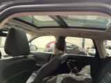 a view of the back seat of a car with the sunroof