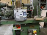 a machine that is sitting on a pallet in a warehouse