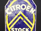 un panneau bleu et jaune sur lequel on peut lire « Citroën Stock »