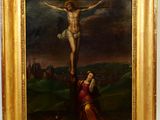 tableau représentant Jésus sur la croix, avec une femme agenouillée à terre