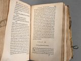an open book that is sitting on a table