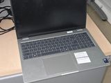 many laptops that are sitting on top of a desk