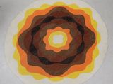 a picture of a circular rug on the floor