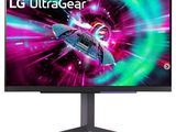 the lg ultragear monitor is shown with a colorful background