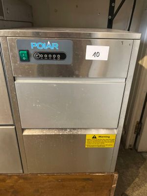 an image of a stainless steel dishwasher sitting on top of a wooden table