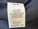 the label on the back of a black jacket
