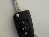 a car key that is attached to a car keychain