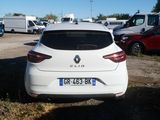 a white car that is parked in a parking lot
