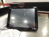 a laptop computer sitting on a table in a room