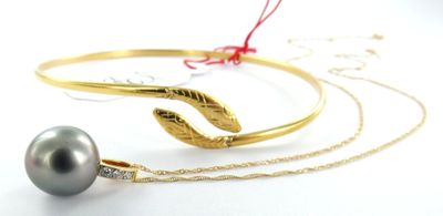1 Bracelet métal, 1 Chaîne Or 750 mil.