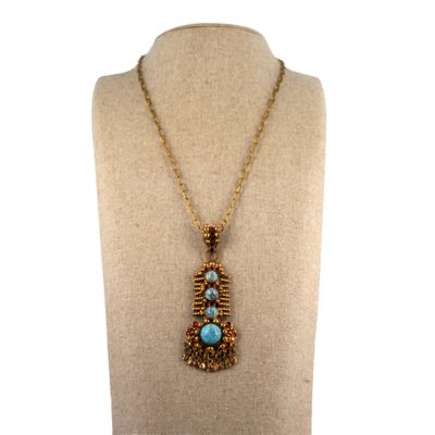 a close up of a necklace on a mannequin mannequin mannequin mannequin mannequin mannequin mannequin mannequin