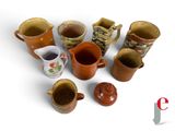 many different types of coffee mugs on a white surface