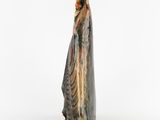 a statue of a woman with a veil on her head