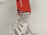 a box of cigarettes sitting on a table next to a box of cigarettes