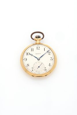 pocket watch on a white surface with a white background
