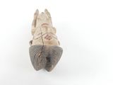 a small piece of wood that is laying on the ground
