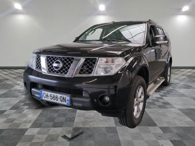 a picture of a black nissan truck parked in a garage