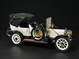 a model of an old model car on a black background