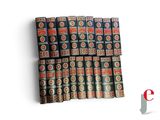 a lot of books stacked on top of each other