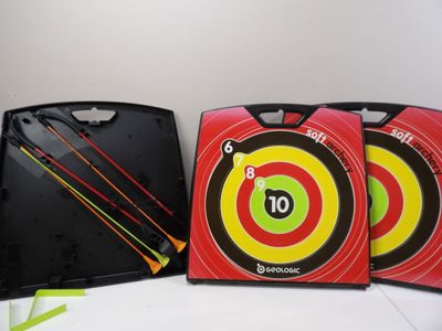 three arrows are in the middle of a red target with a yellow arrow
