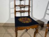 two chairs that are sitting next to each other on the floor