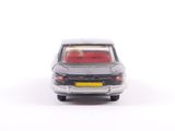 a toy car that is sitting on a white surface