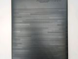 a close up of the back of a black tablet computer