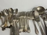 a lot of spoons and spoon spoons on the table