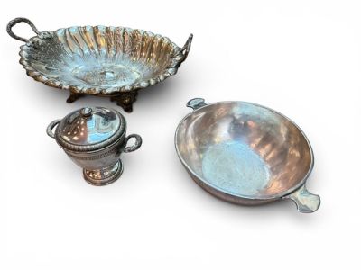 three pieces of silverware including a bowl and a bowl with a lid