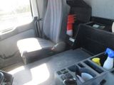 an image of a car with a console and a steering wheel