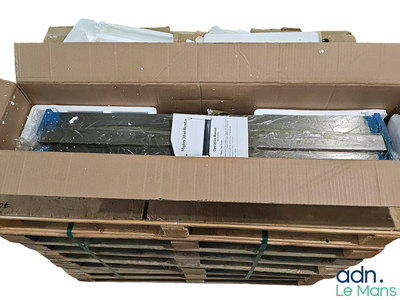 a cardboard box that has a couple of items inside of it