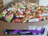 a box full of candy sitting on a pallet