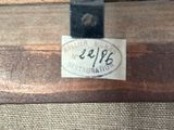a piece of luggage that has a tag on it