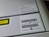 a label on the back of a printer that says mac address