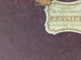 a close up of a piece of luggage with a label on it