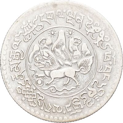 une vieille pièce d'argent sur laquelle est représenté un cheval