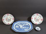 a set of three blue and white plates with flowers on them