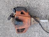 a small corded blower sitting on the ground