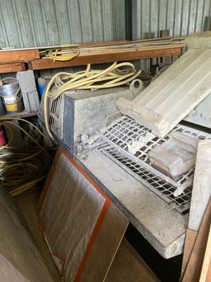an image of a pile of junk in a garage