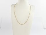 a close up of a mannequin with a necklace on it