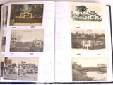 an open book with a bunch of old photos on it