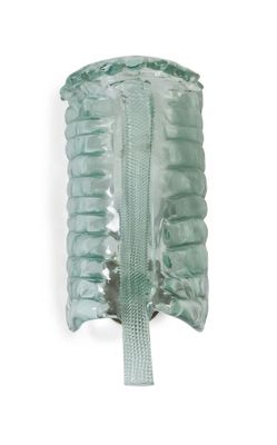 une image représentant un sac vert muni d'une fermeture éclair