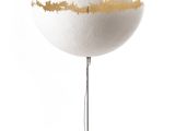 an image of a white lamp with a gold stripe on it